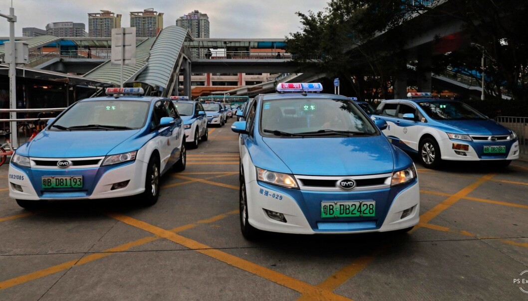 In this Monday, Jan. 7, 2019, photo, new electric-powered taxis are seen in Shenzhen city, south China's Guangdong province. One of China's major cities has reached an environmental milestone, an almost all electric-powered taxi fleet. The high-tech hub of Shenzhen in southern China announced at the start of this year that 99 percent of the 21,689 taxis operating in the city were electric. (AP Photo/Vincent Yu) In this Monday, Jan. 7, 2019, photo, new electric-powered taxis are seen in Shenzhen city, south China's Guangdong province. One of China's major cities has reached an environmental milestone, an almost all electric-powered taxi fleet. The high-tech hub of Shenzhen in southern China announced at the start of this year that 99 percent of the 21,689 taxis operating in the city were electric. (AP Photo/Vincent Yu)