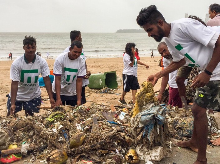 Empower in a clean up operation at the beach of Mumbai, India. Photo: Empower Empower in a clean up operation at the beach of Mumbai, India. Photo: Empower