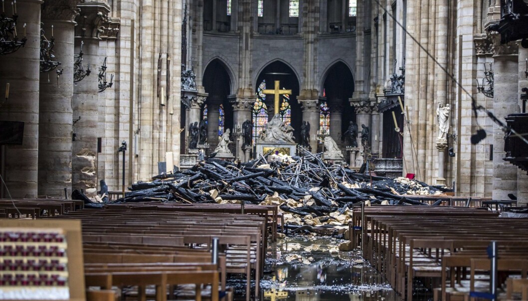 Debris are seen inside the damaged Notre Dame cathedral in Paris, Tuesday, April 16, 2019. Firefighters declared success Tuesday in a more than 12-hour battle to extinguish an inferno engulfing Paris' iconic Notre Dame cathedral that claimed its spire and roof, but spared its bell towers and the purported Crown of Christ. (Christophe Petit Tesson, Pool via AP) Debris are seen inside the damaged Notre Dame cathedral in Paris, Tuesday, April 16, 2019. Firefighters declared success Tuesday in a more than 12-hour battle to extinguish an inferno engulfing Paris' iconic Notre Dame cathedral that claimed its spire and roof, but spared its bell towers and the purported Crown of Christ. (Christophe Petit Tesson, Pool via AP)