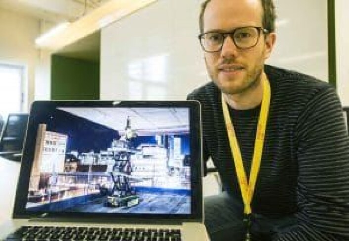 Konrad Fagertun i nLink viser frem boreroboten som han kaller deres egen "Martin Ødegaard". Foto: Per-Ivar Nikolaisen Konrad Fagertun i nLink viser frem boreroboten som han kaller deres egen "Martin Ødegaard". Foto: Per-Ivar Nikolaisen