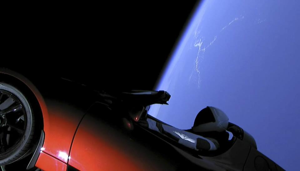 This image from video provided by SpaceX shows the company's spacesuit in Elon Musk's red Tesla sports car. (SpaceX via AP)