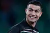 Portugal's Cristiano Ronaldo smiles as he warms up for a World Cup 2026 group F qualifying soccer match between Portugal and Hungary in Lisbon, Tuesday, Oct. 14, 2025. (AP Photo/Armando Franca)